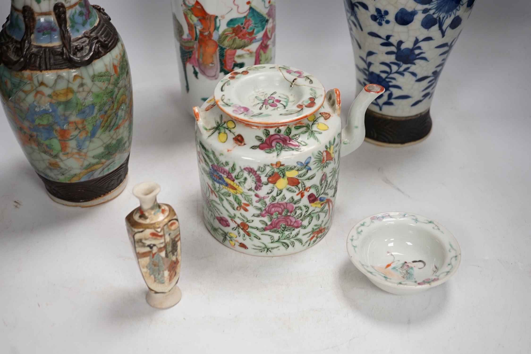 Three pairs of Chinese vases, a teapot, two bowls and a pair of miniature Satsuma vases, tallest item crackleware vases and covers 32cm high. Condition - poor